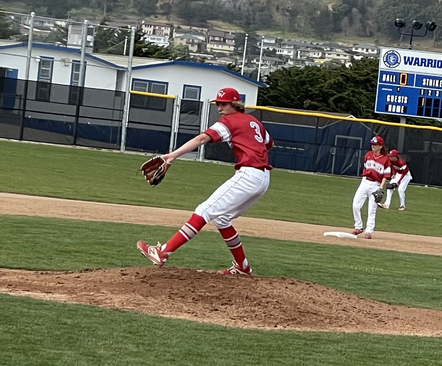 Shows an Athlete Pitching a Baseball